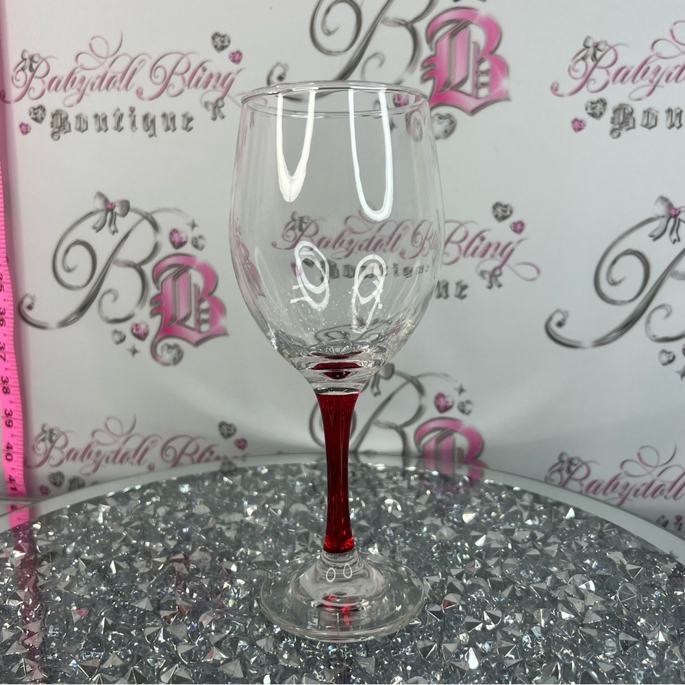 Clear Wine Glass with Red Stem